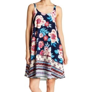 Dual Nature Cirsscross Back Floral Swing Short Dress